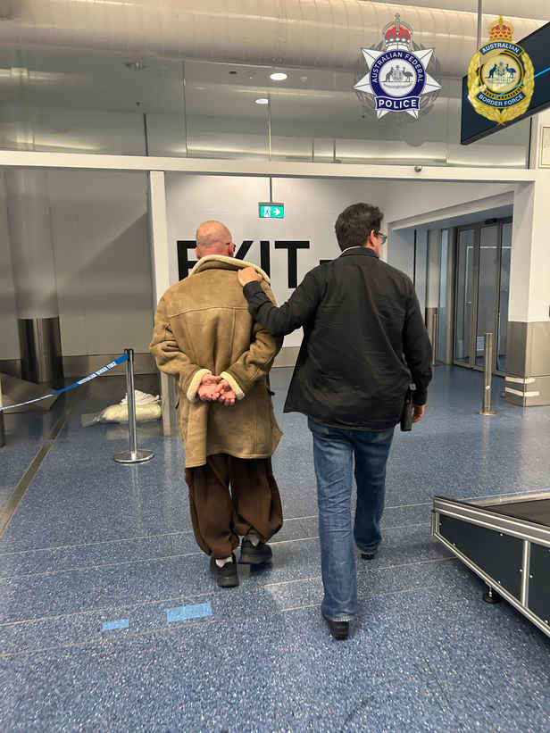 Australian man charged with child sex offences after airport luggage find