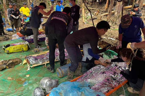 Rescuers free four men who had been trapped in a flooded Laos cave
